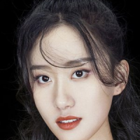 Куан Сяо Тун